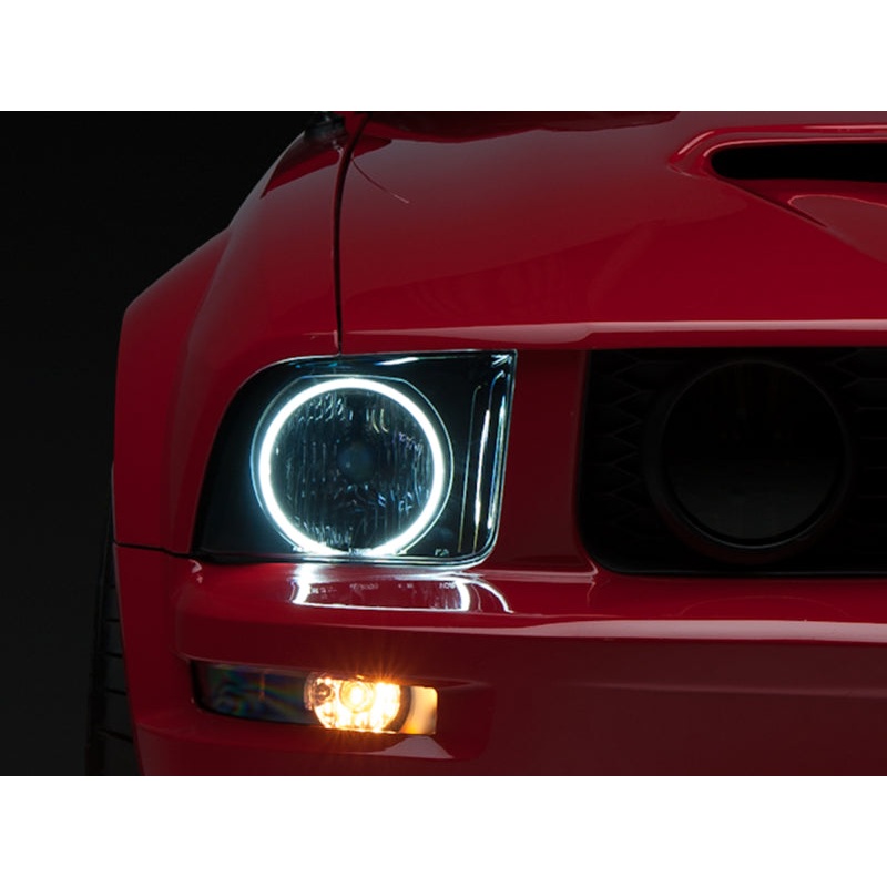 Raxiom 05-09 Ford Mustang GT V6 Axial Series CCFL Halo Projector Headlight- Blk Housing | Smkd Lens