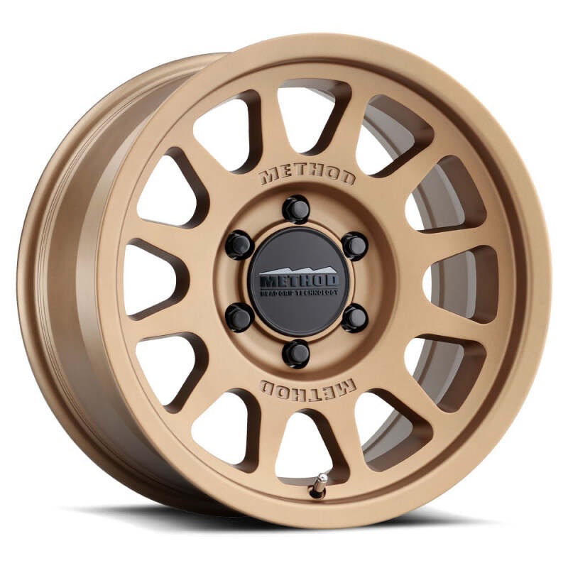 Method MR703 17×9 / -12mm Offset / 106.25mm Bore / 6×5.5 BP / 4.8in BS – Method Bronze Wheel
